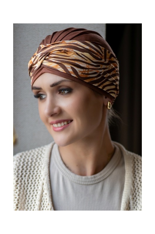 Turban aus Bambus-Viskose mit separatem Animal-Print-Band – weich & stilvoll. Turban aus Bambus-Viskose mit separatem Animal-Print-Band – weich & stilvoll.