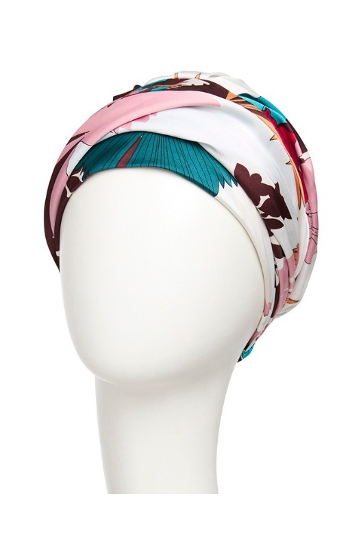 Der beeindruckende Turban HocSapphire Boho Floral Fusion besticht durch sein intensives florales Muster in leuchtenden Farben.
